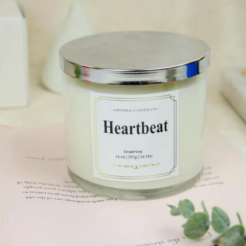 scented candles in tumbler glass jars